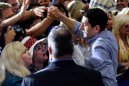 Republican vice presidential candidate Rep. Paul Ryan R-Wis., greets his supporters during a campaign event at Palo Verde High School on Tuesday, Aug. 14, 2012 in Las Vegas. (AP Photo/David Becker)